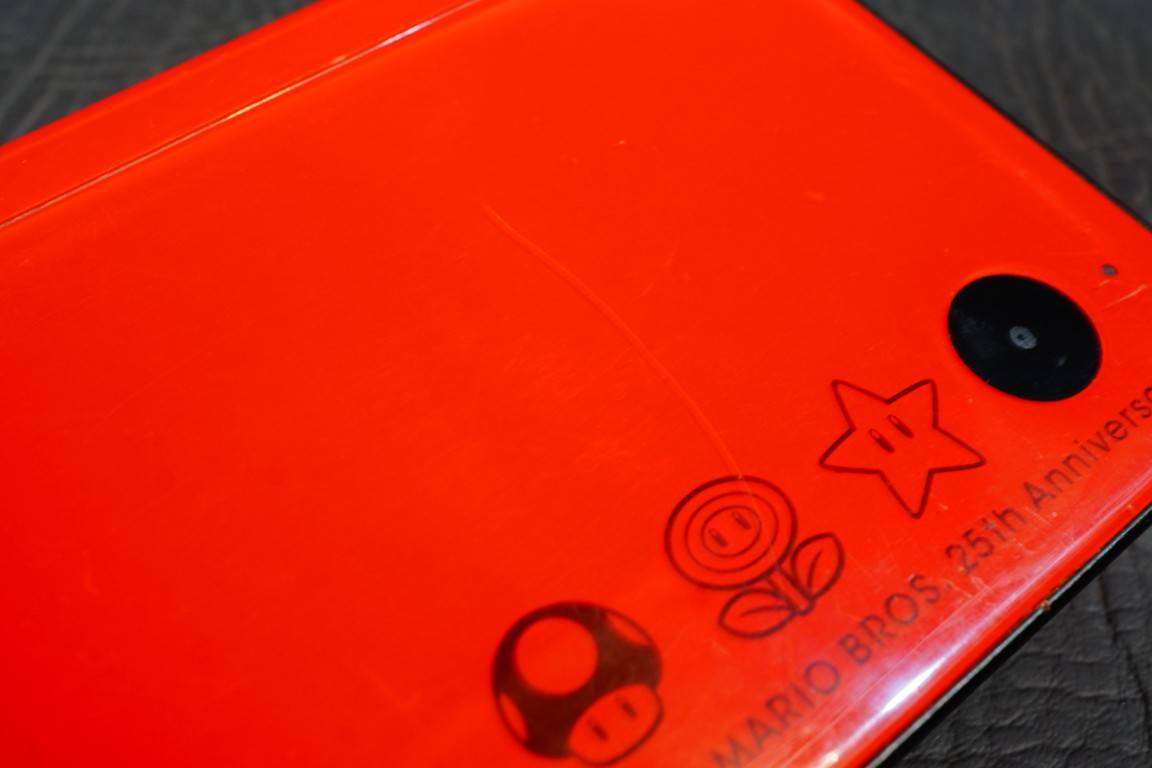 Nintendo DSI XL Red Handheld Console Super Mario Bros. 25th Anniversary Edition **Good Condition**