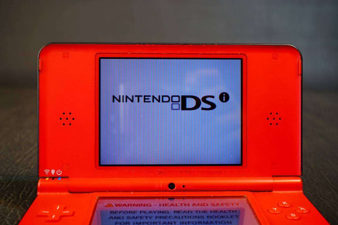 Nintendo DSI XL Red Handheld Console Super Mario Bros. 25th Anniversary Edition **Good Condition**