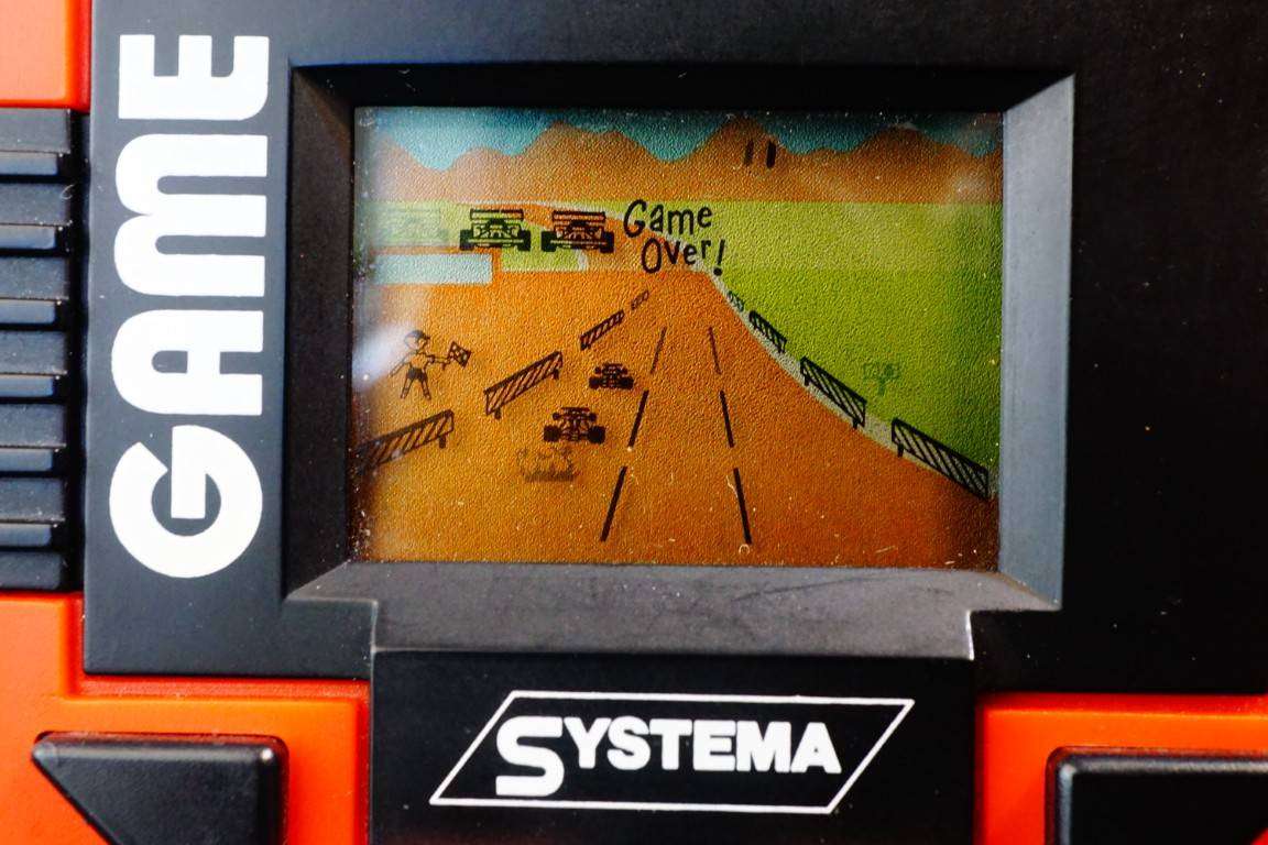 Vintage Systema Car F1 Race Handheld LCD Game with original Packaging - 1980s **Great Condition**