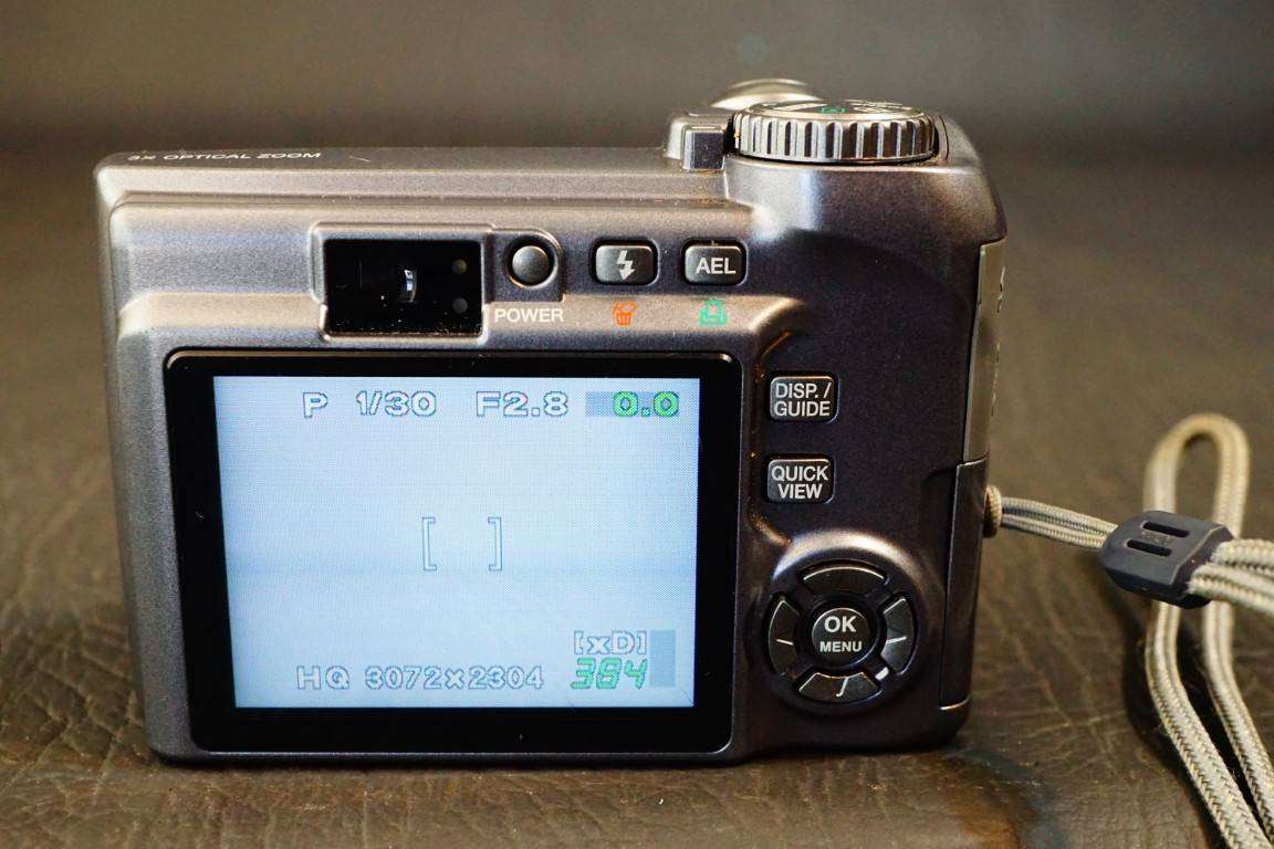 Olympus SP Series SP-320 7.1MP Digital Camera 3x Optical Zoom uses AA Batteries  **Good Condition**