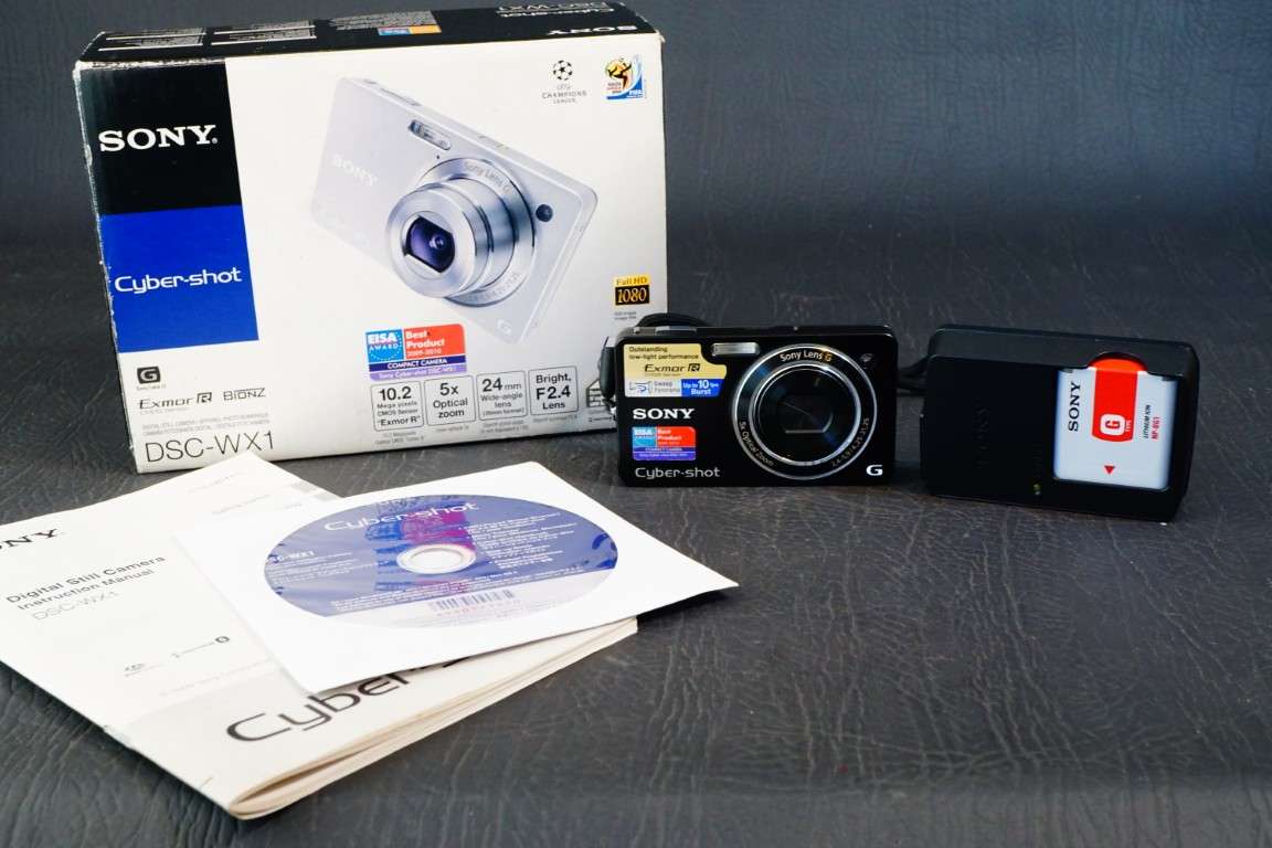 Sony Cyber Shot DSC-WX1 10.2 MP Digital Camera 5X Zoom with Original Box  **Great Condition**