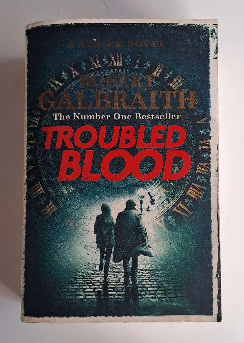 Troubled Blood. - Robert Galbraith (Softcover)