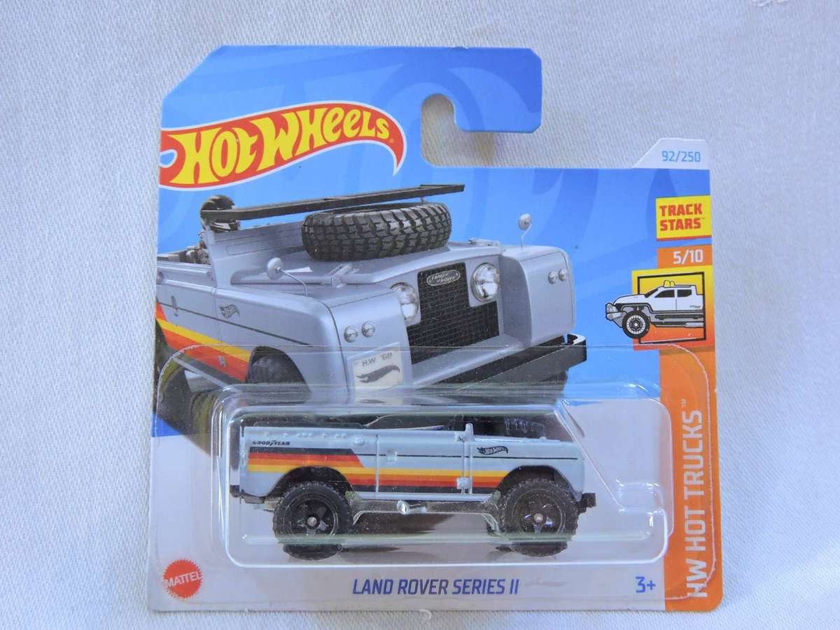 Hot Wheels Land Rover Series 11 ( Grey with Surf Board )