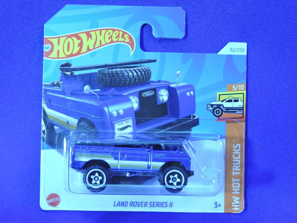 Hot Wheels LAND ROVER SERIES 11 ( Blue with surf board )