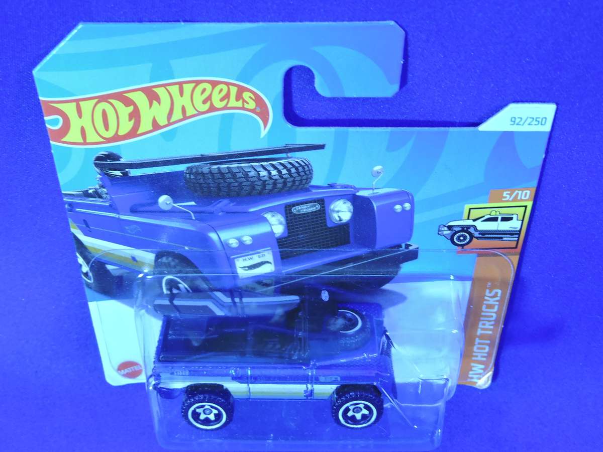 Hot Wheels LAND ROVER SERIES 11 ( Blue with surf board )
