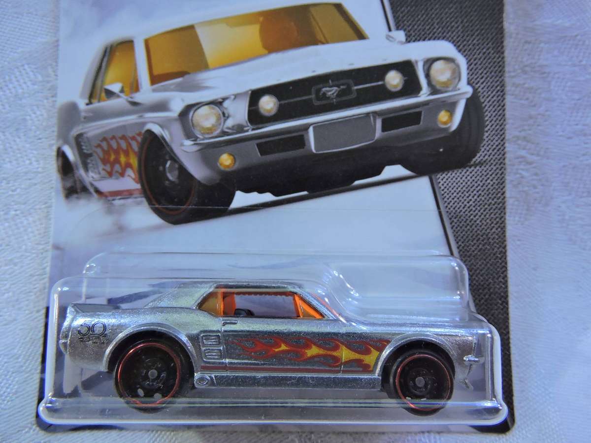 Hot Wheels FORD Mustang GT Coupe ( Silver yellow flames ) ZAMAC  Long Card 1/8