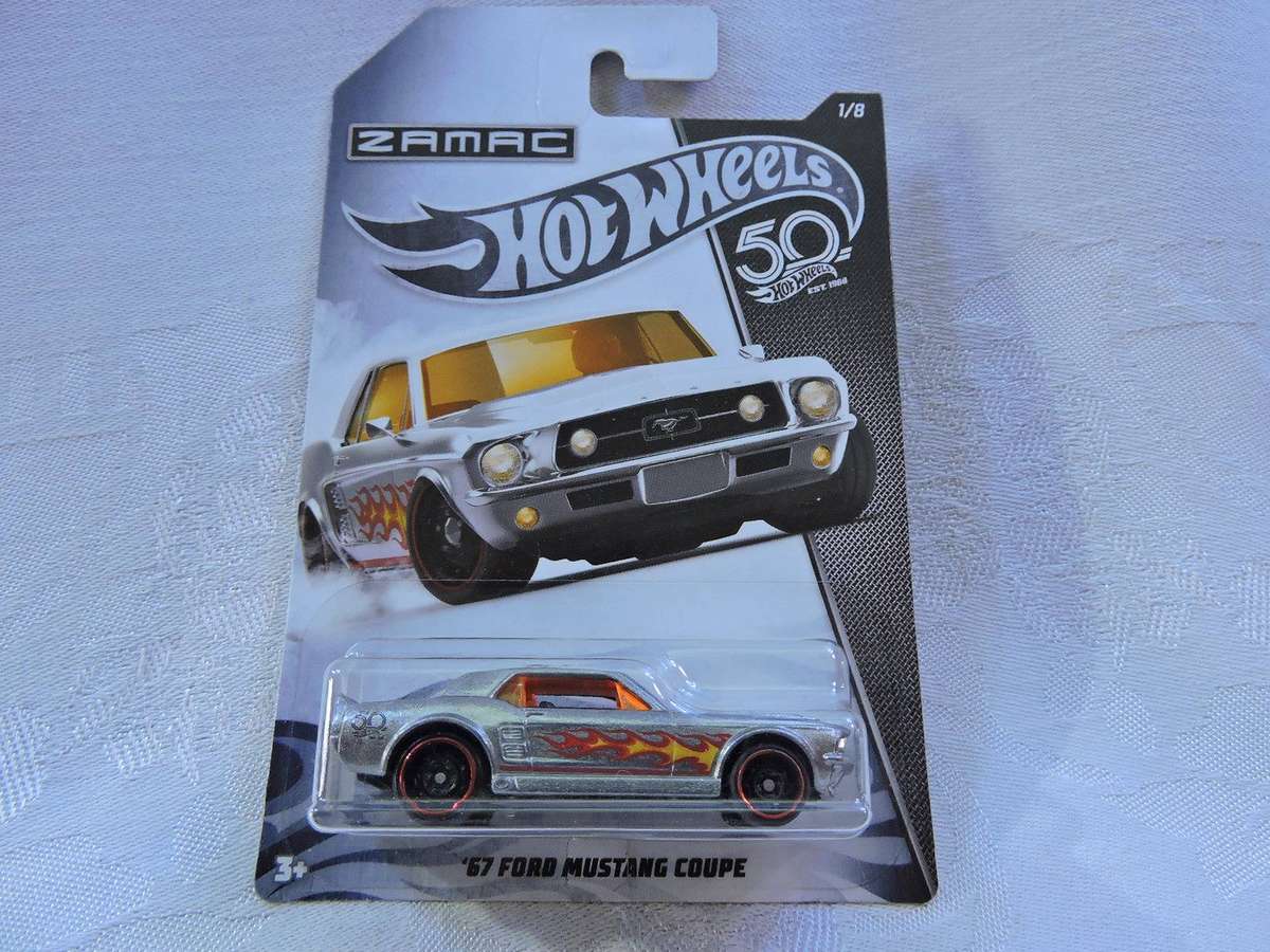 Hot Wheels FORD Mustang GT Coupe ( Silver yellow flames ) ZAMAC  Long Card 1/8