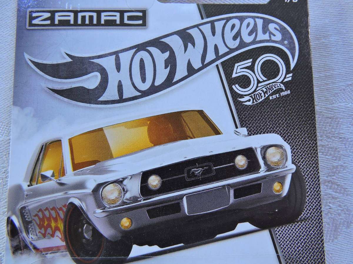 Hot Wheels FORD Mustang GT Coupe ( Silver yellow flames ) ZAMAC  Long Card 1/8