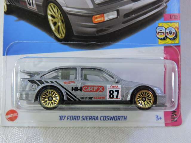 Hot Wheels FORD SIERRA COSWORTH ( Silver #87 ) Long Card