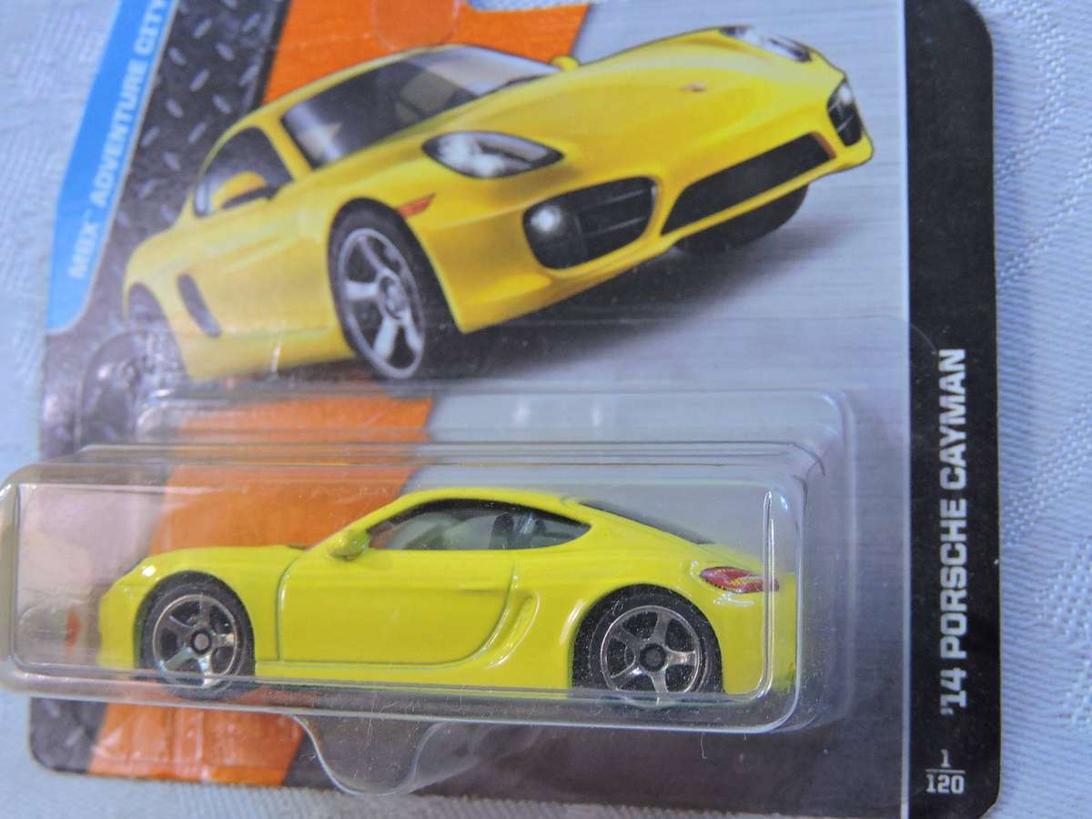 Matchbox PORSCHE Cayman ( Yellow ) Released 2014. 12 Yrs old already!   Like Hot Wheels