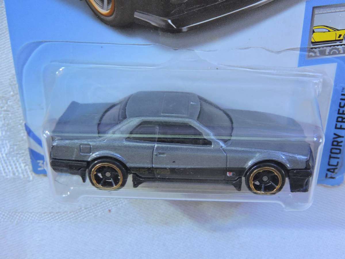 Hot Wheels NISSAN SKYLINE R30 ( Grey & Black ) Like Datsun Long Card