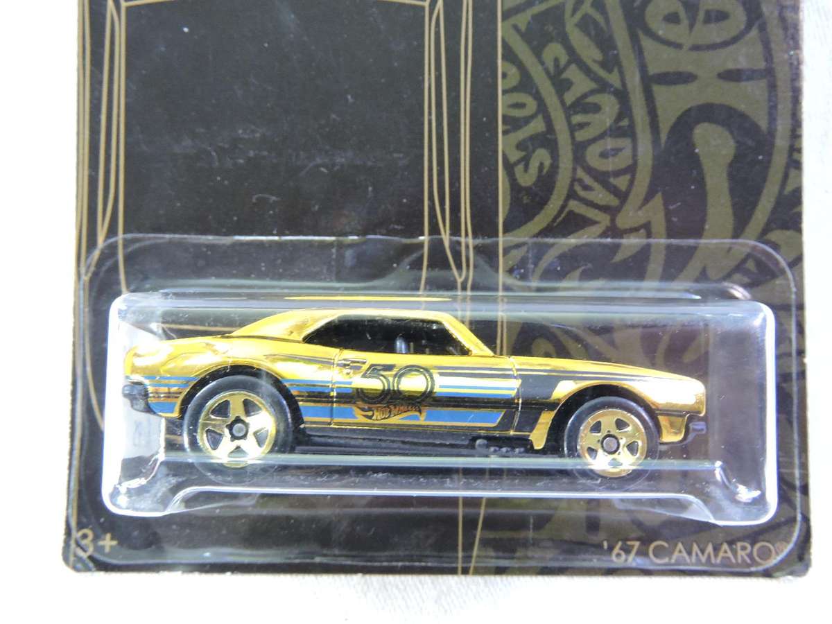 Hot Wheels Chevy Chevrolet Camaro ( Gold CHASE CAR  )  Scarce and hard to find model   Long Card