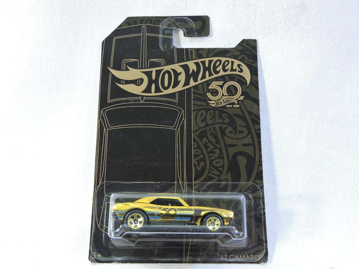 Hot Wheels Chevy Chevrolet Camaro ( Gold CHASE CAR  )  Scarce and hard to find model   Long Card