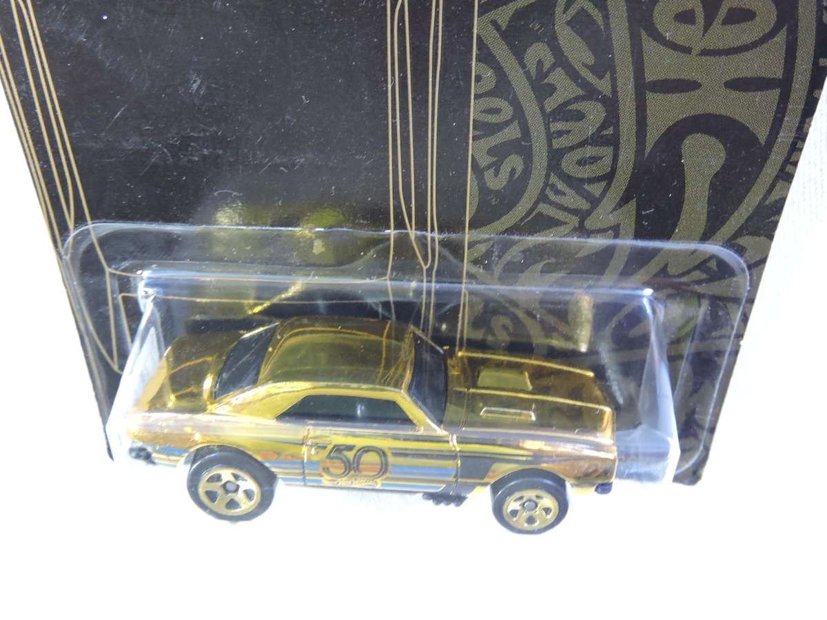 Hot Wheels Chevy Chevrolet Camaro ( Gold CHASE CAR  )  Scarce and hard to find model   Long Card