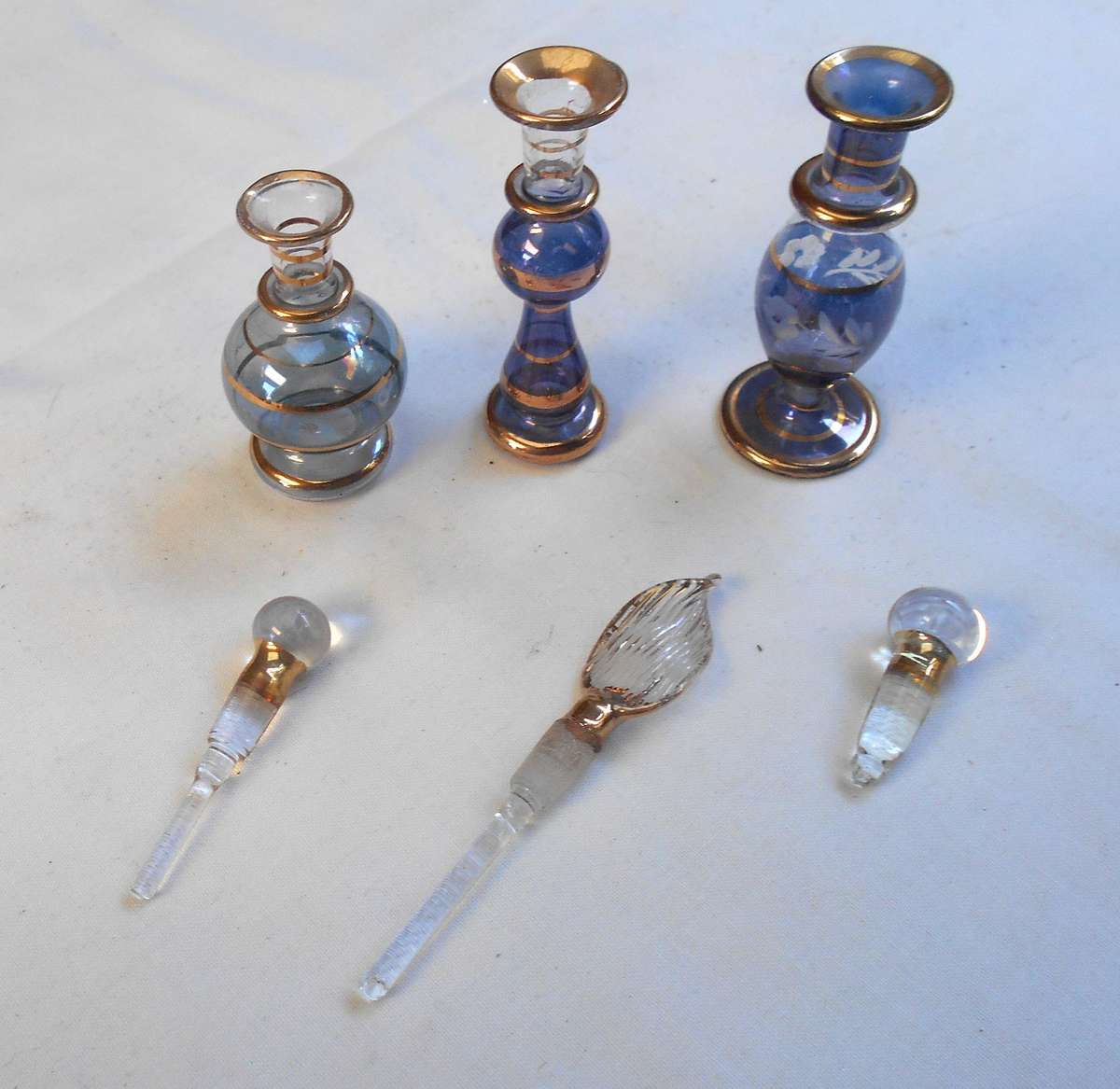 STUNNING three MINIATURE dark blue /purple COLOUR EGYPTIAN GLASS PERFUME BOTTLES WITH DAPPERS