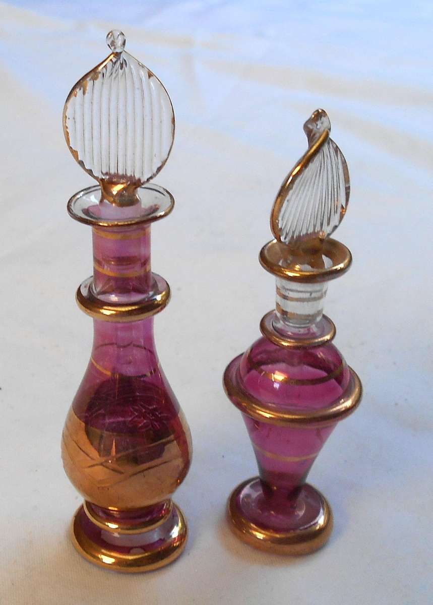 STUNNING two MINIATURE MAUVE/PURPLE COLOUR EGYPTIAN GLASS PERFUME BOTTLES WITH DAPPERS