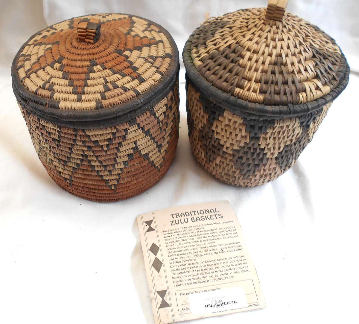 TWO TRADITIONAL WEAVE ZULU BASKETS WITH LABEL