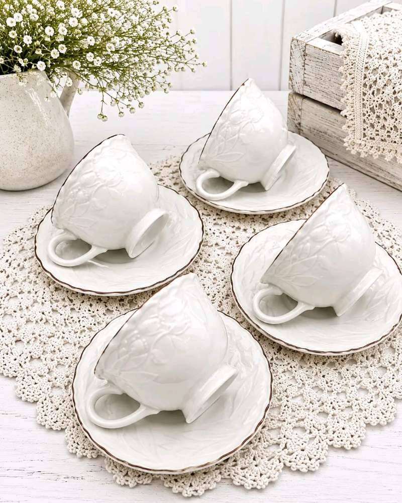 Set of 4 Large white porcelain cups and saucers