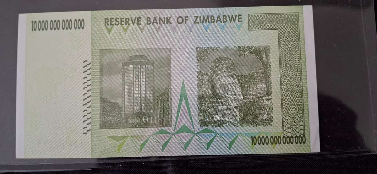RESERVE BANK OF ZIMBABWE  10 TRILLION DOLLARS   2008 SERIAL NUMBER AA0123537  UNCIRCULATED