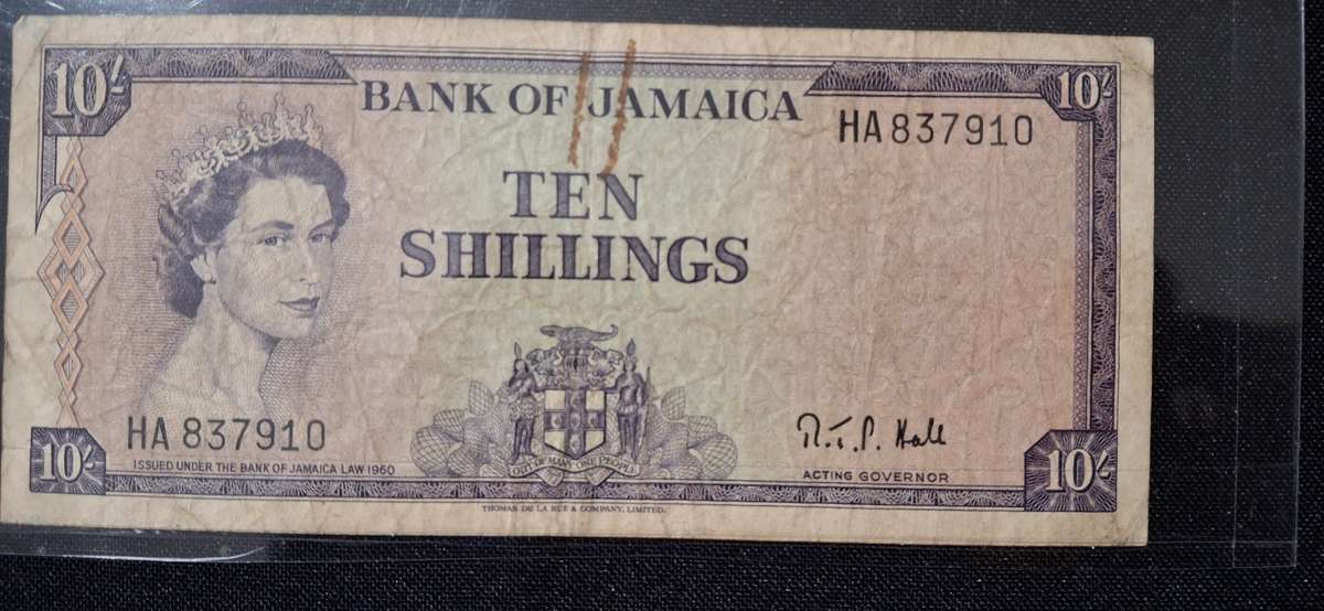 QUEEN ELIZABETH 11 BANK OF JAMAICA  10 SHILLINGS NOTE NUMBER HA837910 CIRCULATED SCARCE