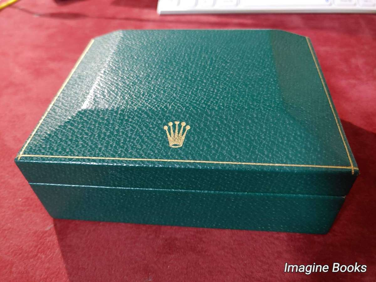 Rolex Watch Box: 'Coffin' Type with booklet and Rolex/Bucherer Spoon