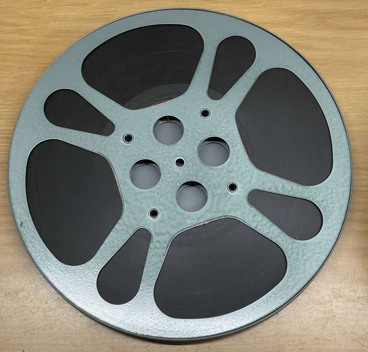16MM Movie Reel in Metal Case - Pay After Trinity