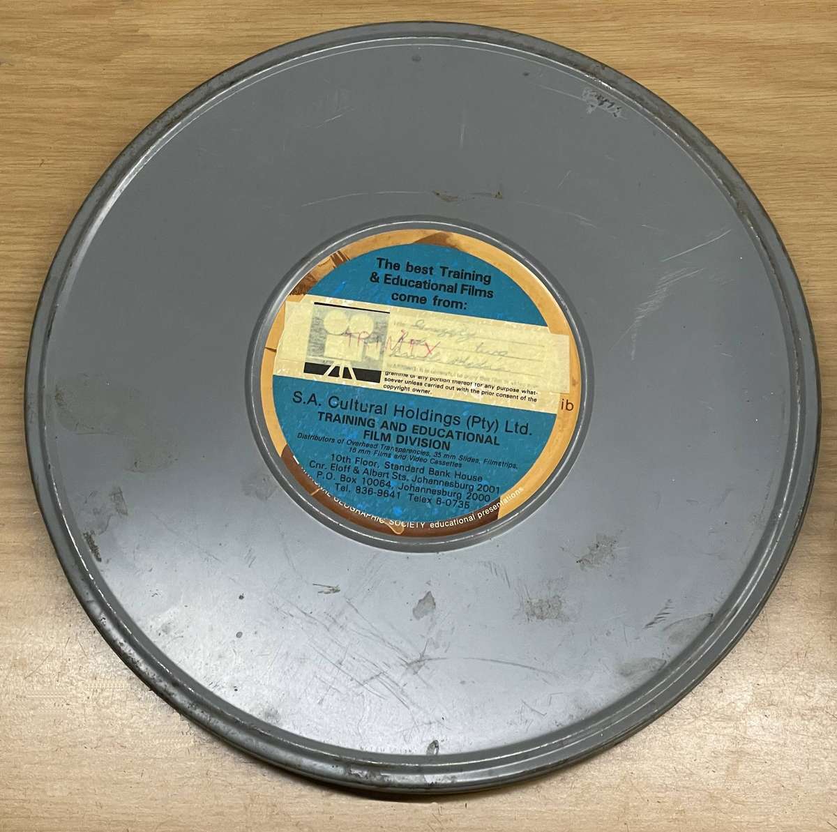 16MM Movie Reel in Metal Case - Pay After Trinity
