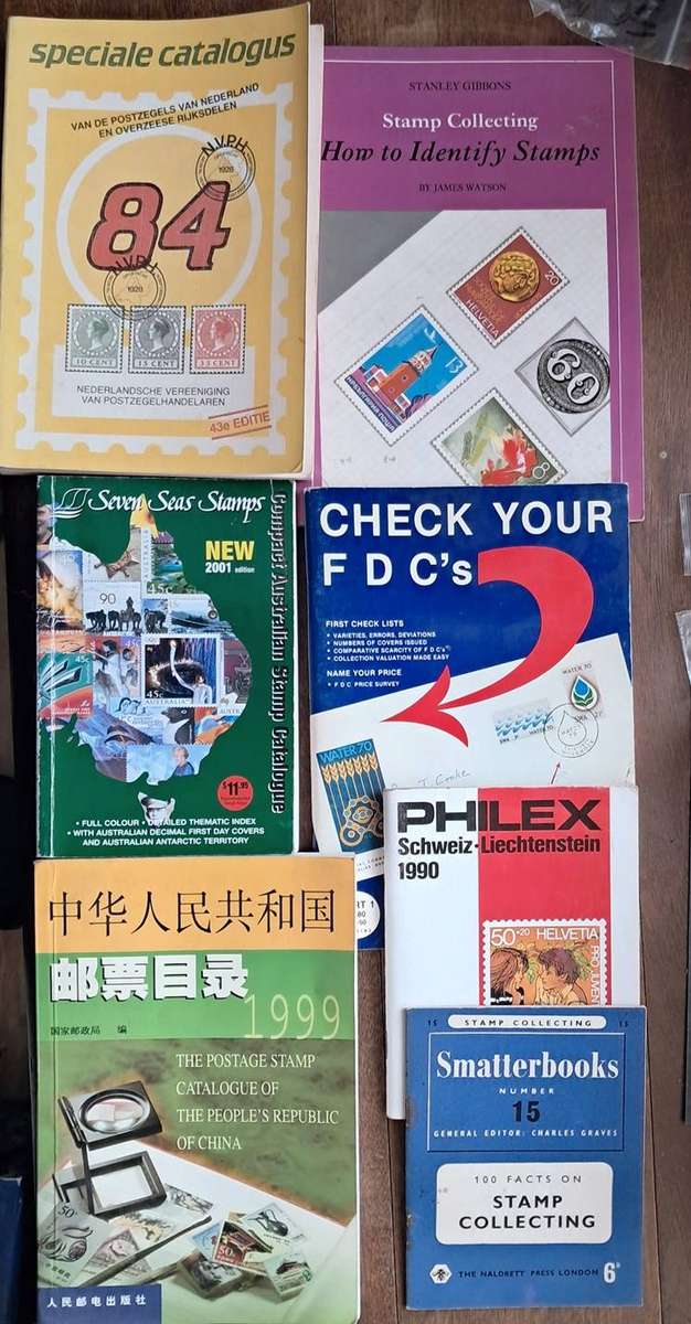 MIX OF DIFFERENT STAMP BOOKS AND CATALOGUES