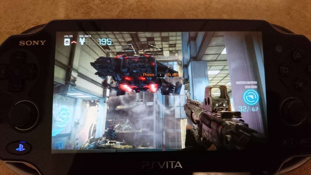 Sony PlayStation Vita OLED WiFi 3G Console - Black (PS Vita) + Sony Memory Card + Games