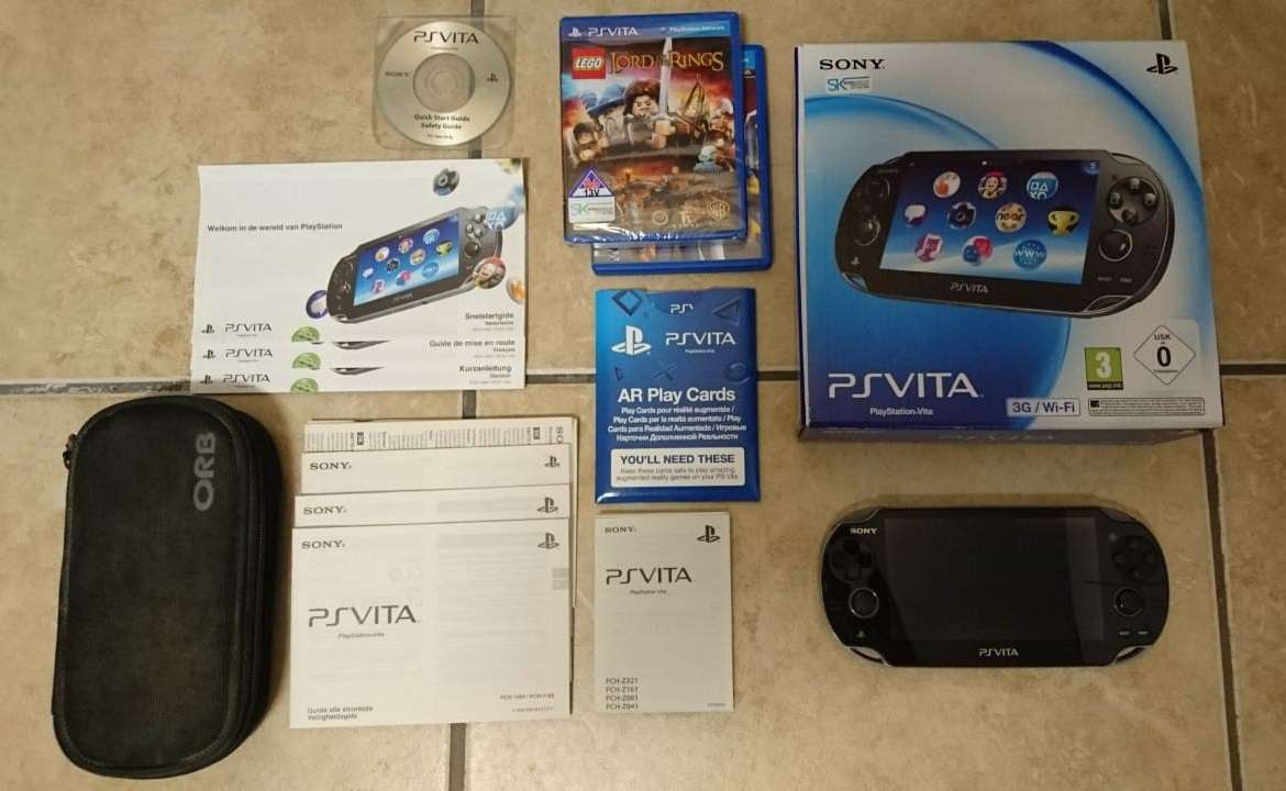 Sony PlayStation Vita OLED WiFi 3G Console - Black (PS Vita) + Sony Memory Card + Games