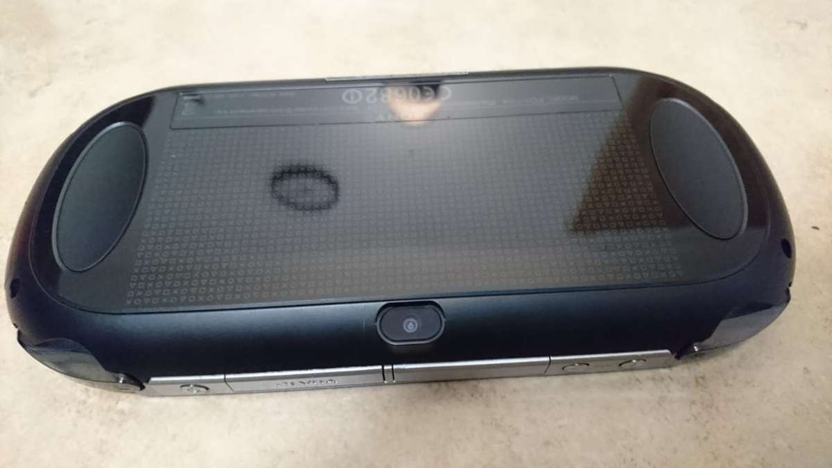 Sony PlayStation Vita OLED WiFi 3G Console - Black (PS Vita) + Sony Memory Card + Games