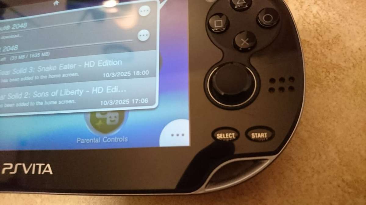 Sony PlayStation Vita OLED WiFi 3G Console - Black (PS Vita) + Sony Memory Card + Games