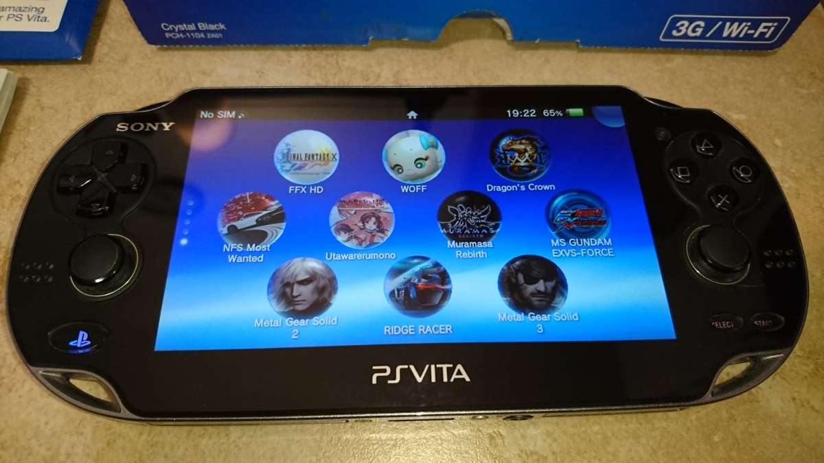 Sony PlayStation Vita OLED WiFi 3G Console - Black (PS Vita) + Sony Memory Card + Games