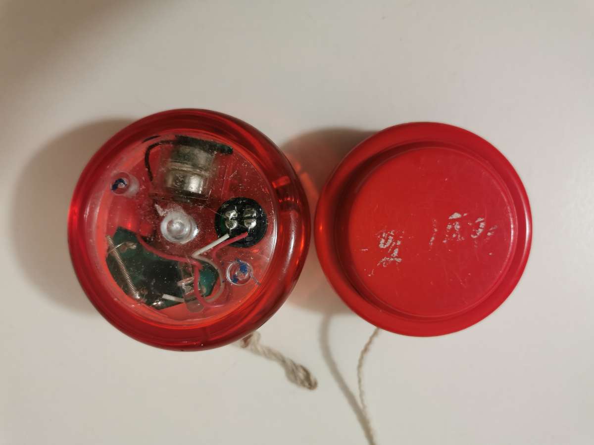 Two yoyos - light up and coke.