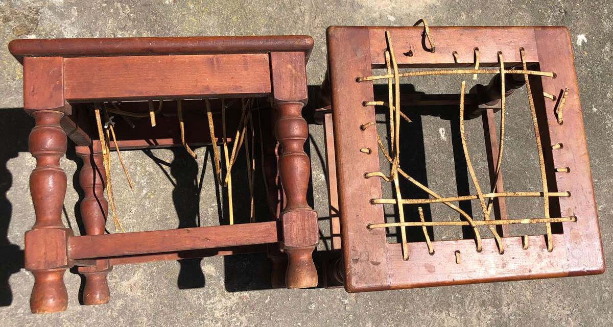 RIEMPIE STOOLS OR FOOTSTOOLS PAIR VINTAGE BURMESE TEAK WITH TYPICAL STRETCHER BASES OF THE PERIOD