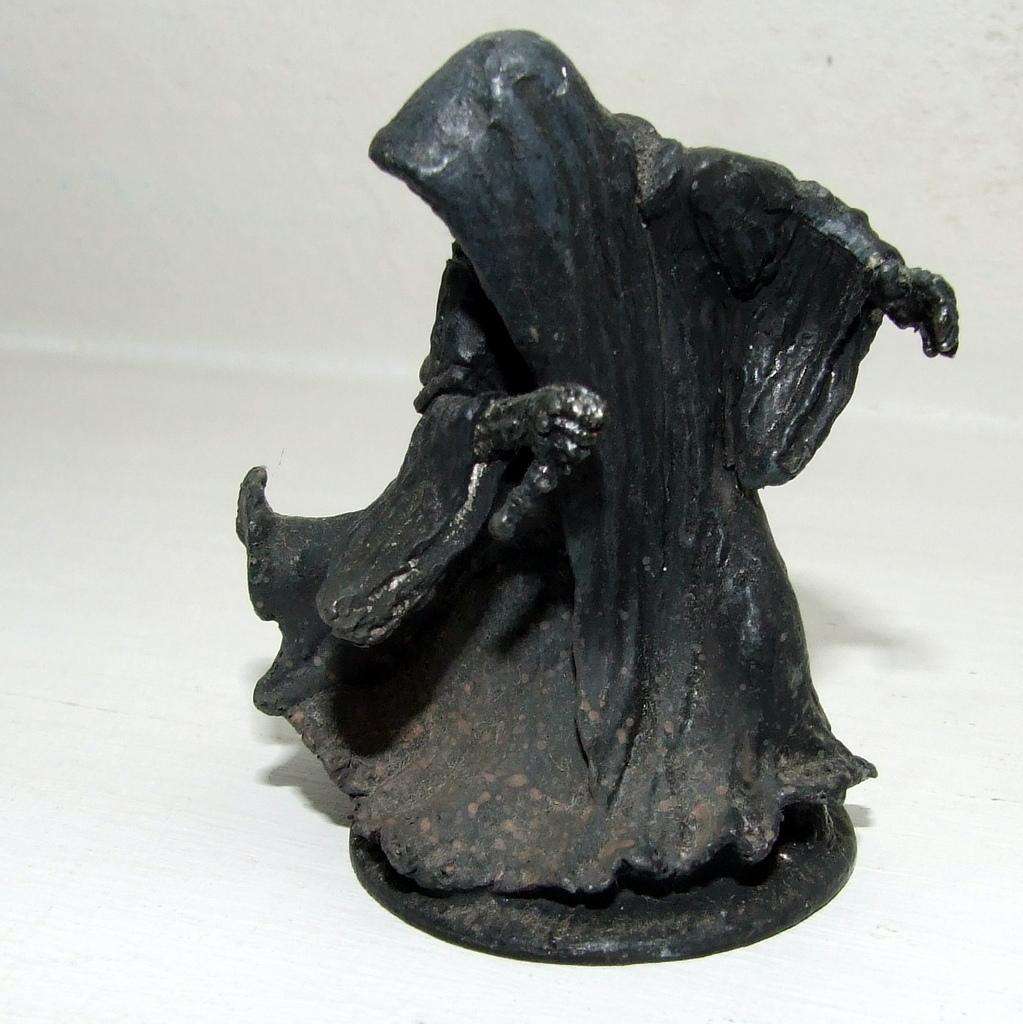 Four played with LORD OF THE RINGS figurines