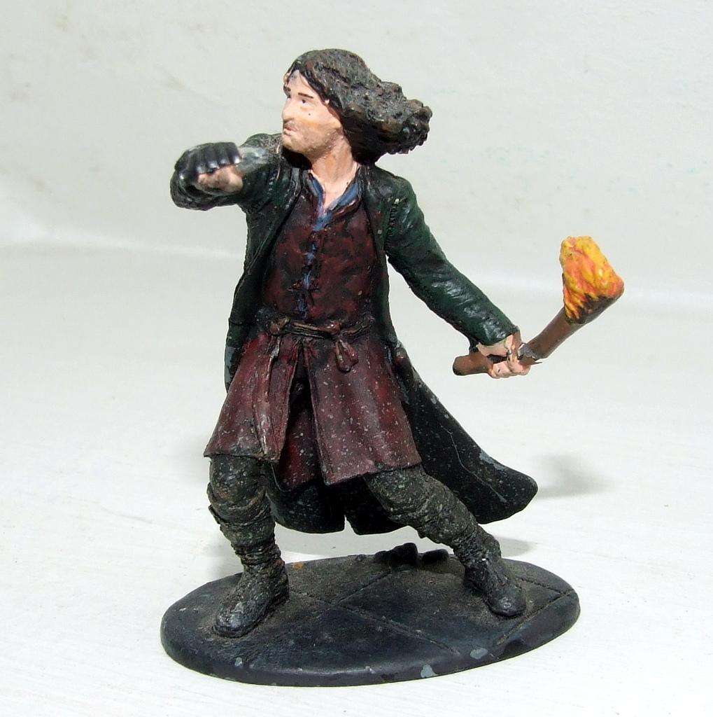 Four played with LORD OF THE RINGS figurines