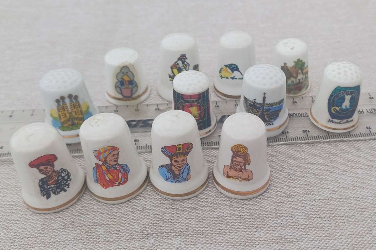 12 Porcelain thimbles