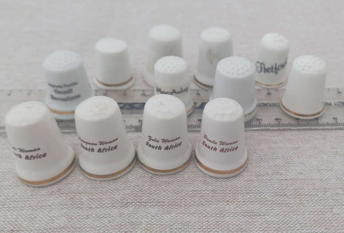 12 Porcelain thimbles