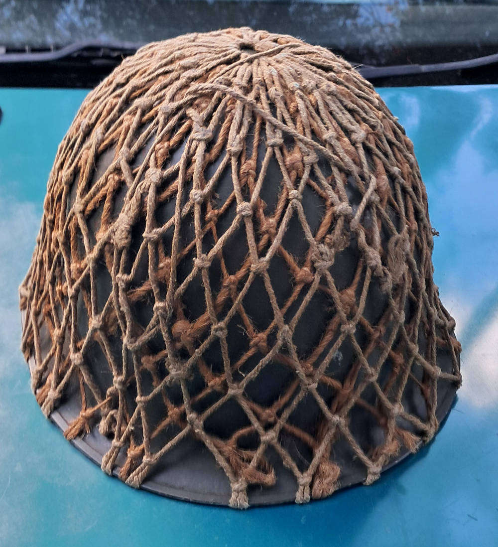 A complete Old Army 1970's staaldak helmet in good condition