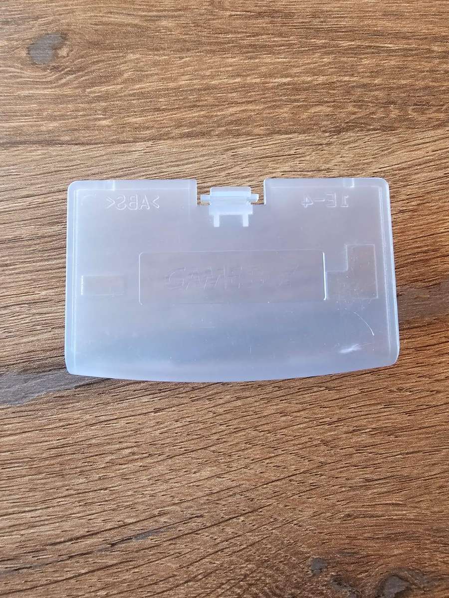 Nintendo Game Boy Advance battery cover (original, transparent blue)