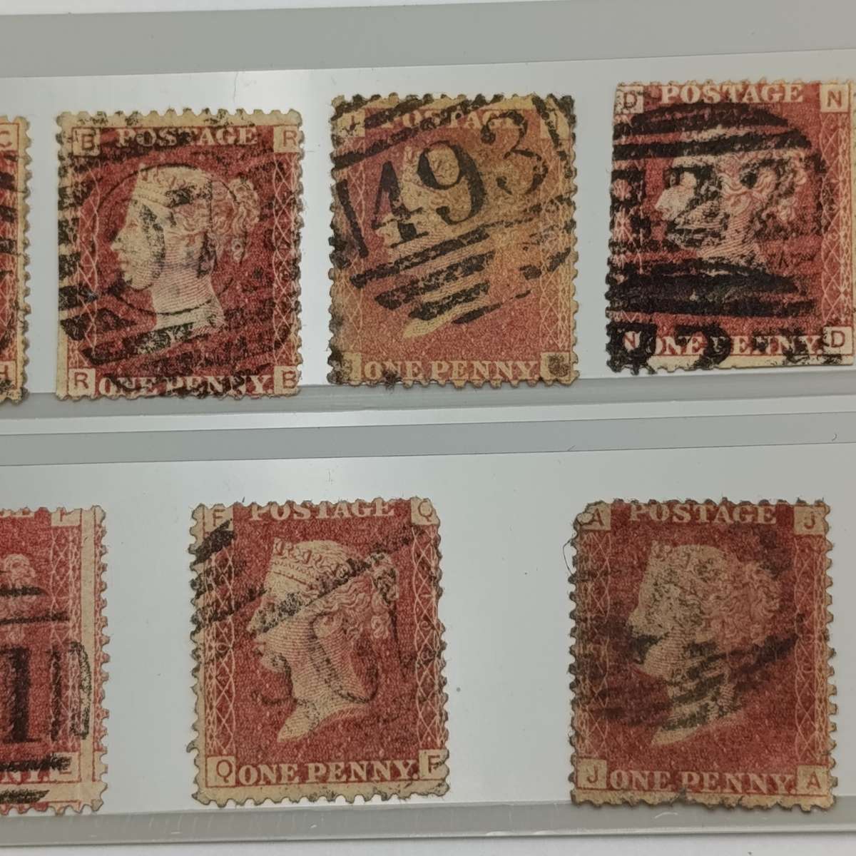 Lot of 9 penny red stamps circa 1858 - plate numbers included are: 90, 92, 102, 103, 108, 112