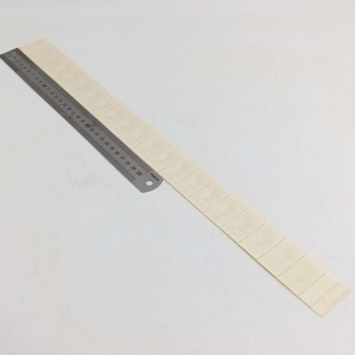 SACC 252 - strip of 20 stamps with white line printing flaw through strip