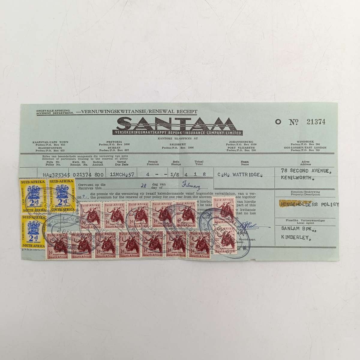 1957 Santam receipt with 3x revenue stamps and 14x 1d postuge stamps used as revenue stamps
