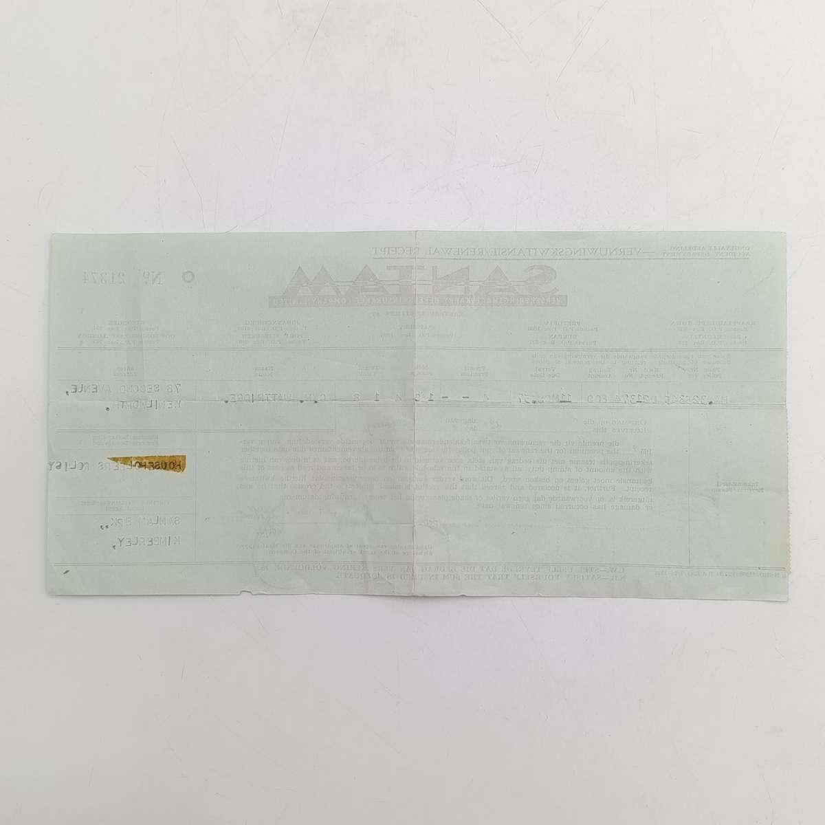 1957 Santam receipt with 3x revenue stamps and 14x 1d postuge stamps used as revenue stamps