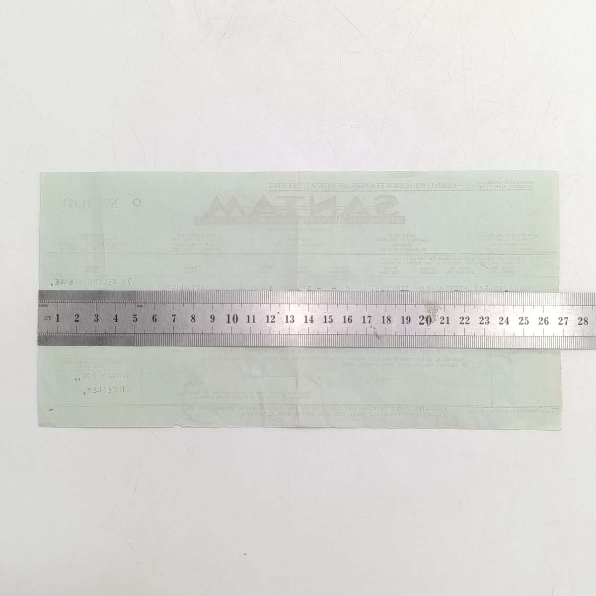 1957 Santam receipt with 3x revenue stamps and 14x 1d postuge stamps used as revenue stamps