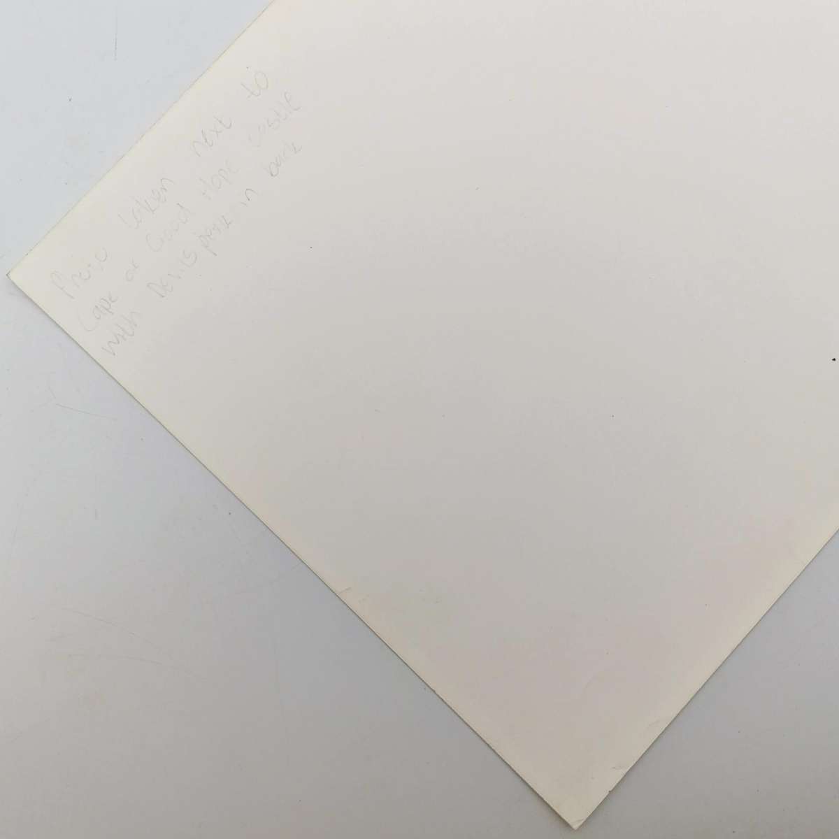 Antique photo reprint of horse cart next to Castle of Good Hope wall with Devils Peak in back