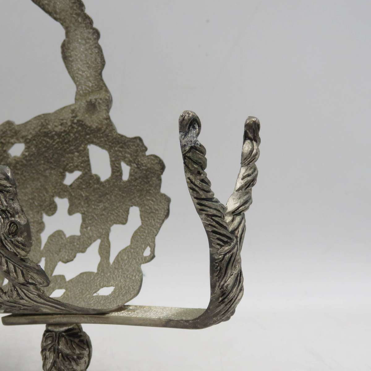 Vintage silverplated vintner motif wine bottle stand