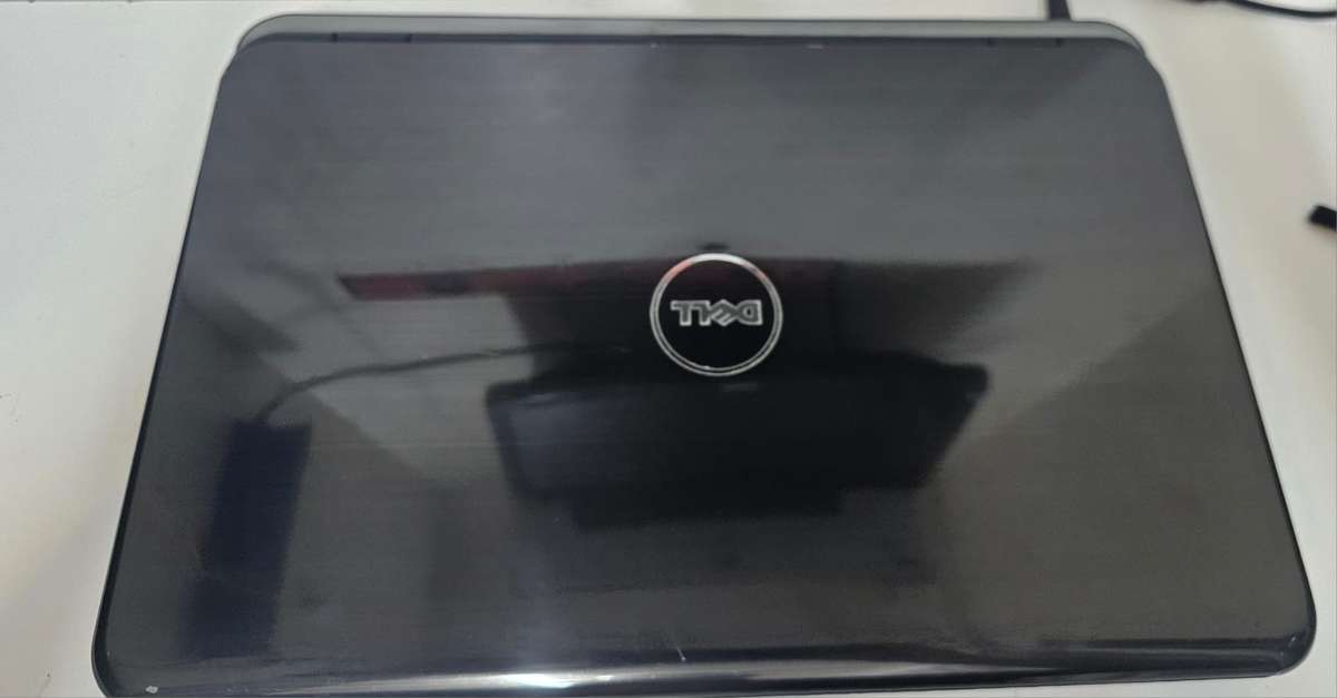 Dell Inspiron N5010 laptop i3, 3GB RAM, 320GB HDD, DVD writer, working, battery needs replacing