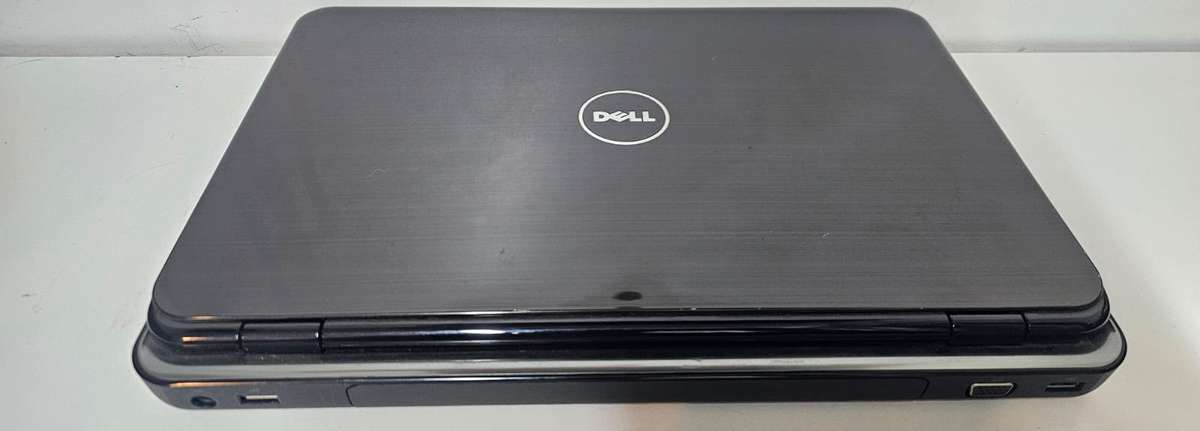 Dell Inspiron N5010 laptop i3, 3GB RAM, 320GB HDD, DVD writer, working, battery needs replacing
